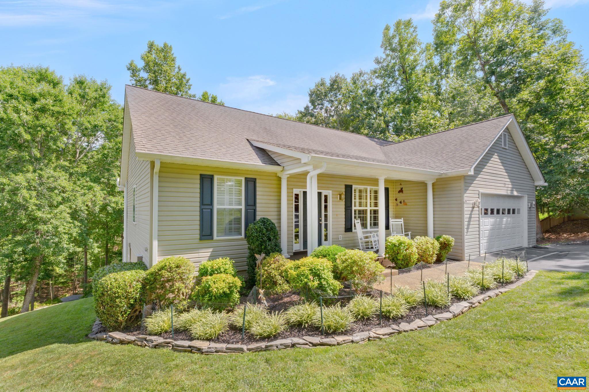 27 Kingswood Road Palmyra, VA 22963 - Photo 32 of 60 a front view of a house with a yard