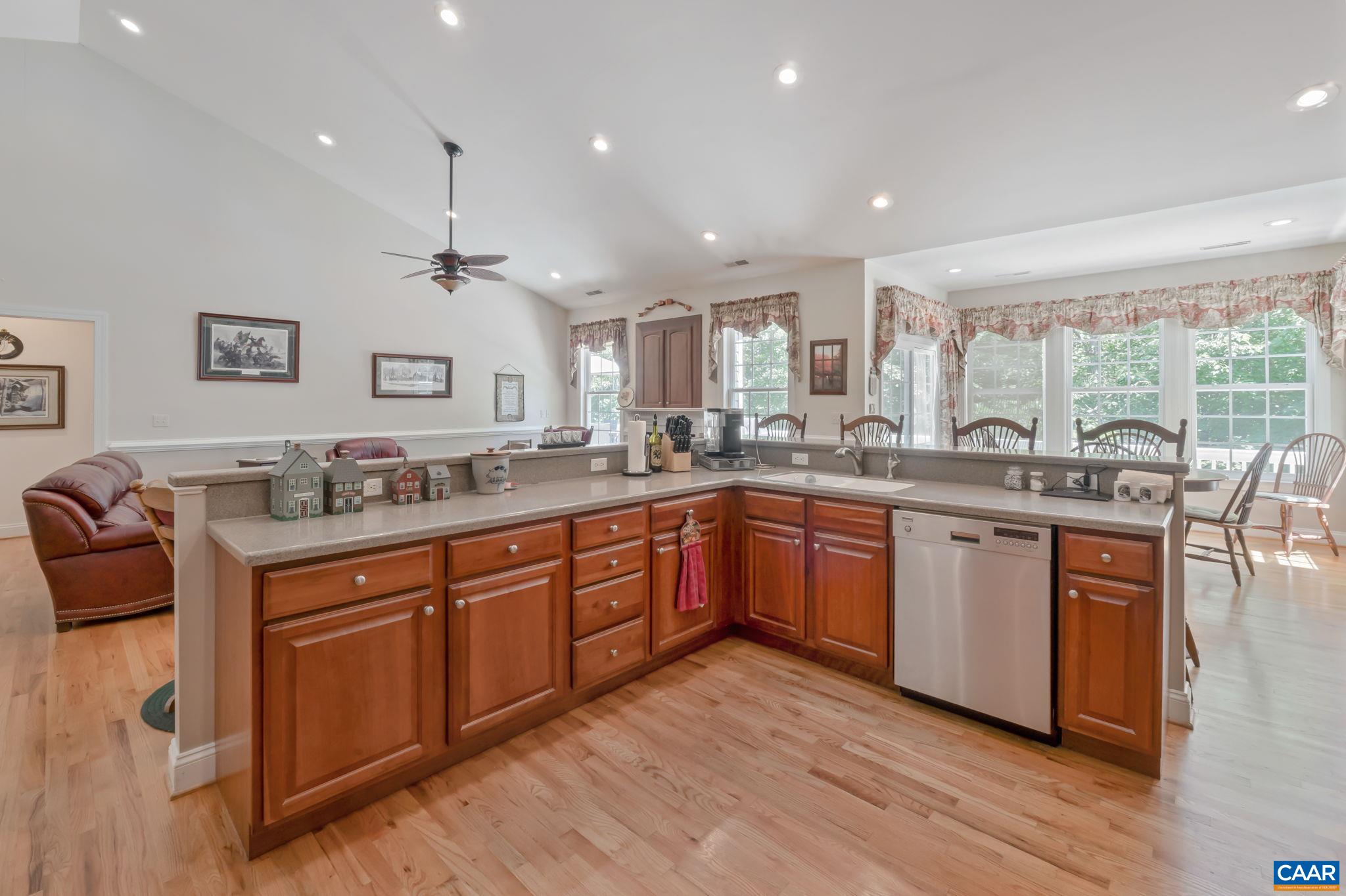 27 Kingswood Road Palmyra, VA 22963 - Photo 4 of 60 a large kitchen with stainless steel appliances granite countertop a large center island and a sink