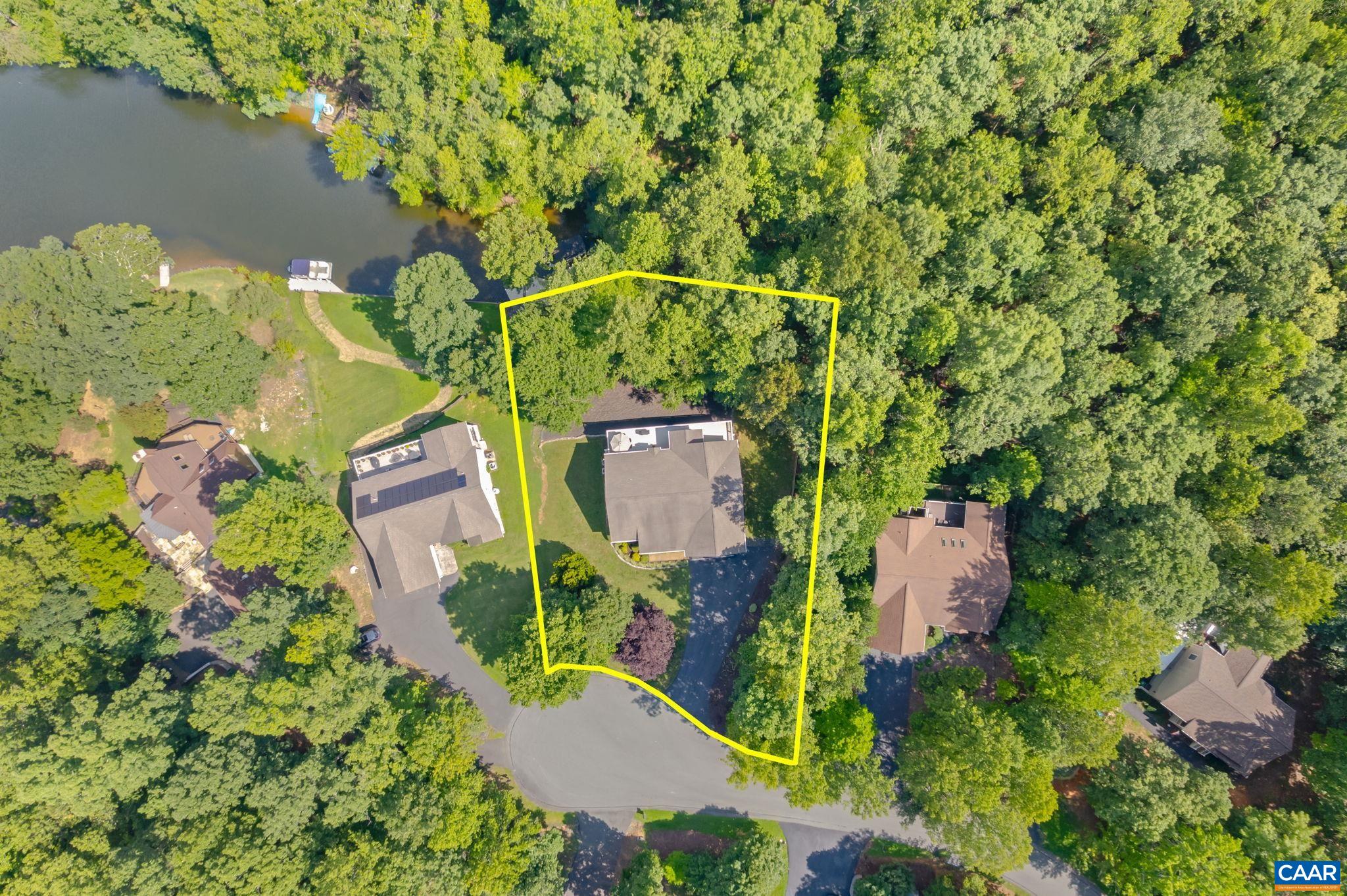 27 Kingswood Road Palmyra, VA 22963 - Photo 41 of 60 an aerial view of a house with a yard and lake view