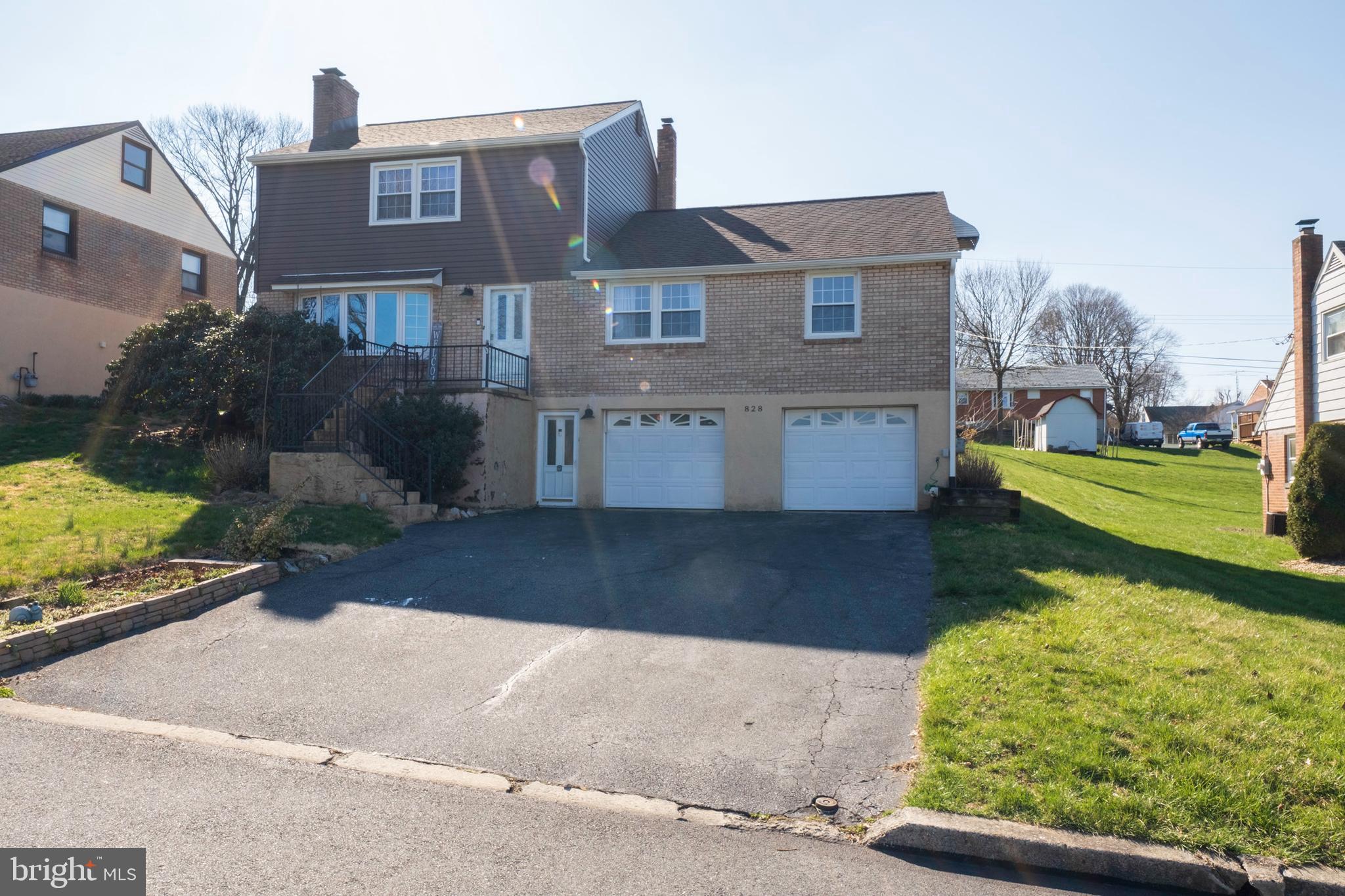 828 Rhodora Avenue Reading, PA 19605 - Photo 1 of 23 Large Home with brick exterior.