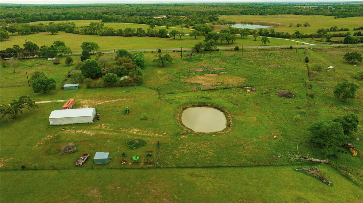 2222 Fm 974 Bryan, TX 77808 - Photo 2 of 10 a view of a golf course with a lake