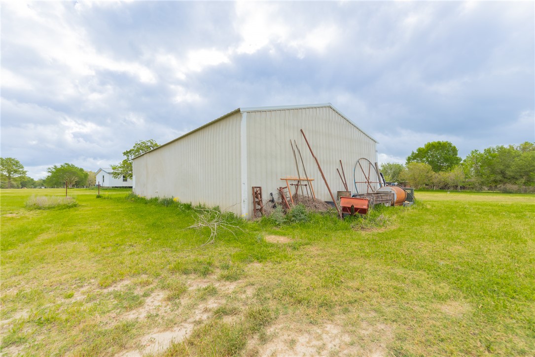 2222 Fm 974 Bryan, TX 77808 - Photo 7 of 10 a view of pool with lawn chairs and plants