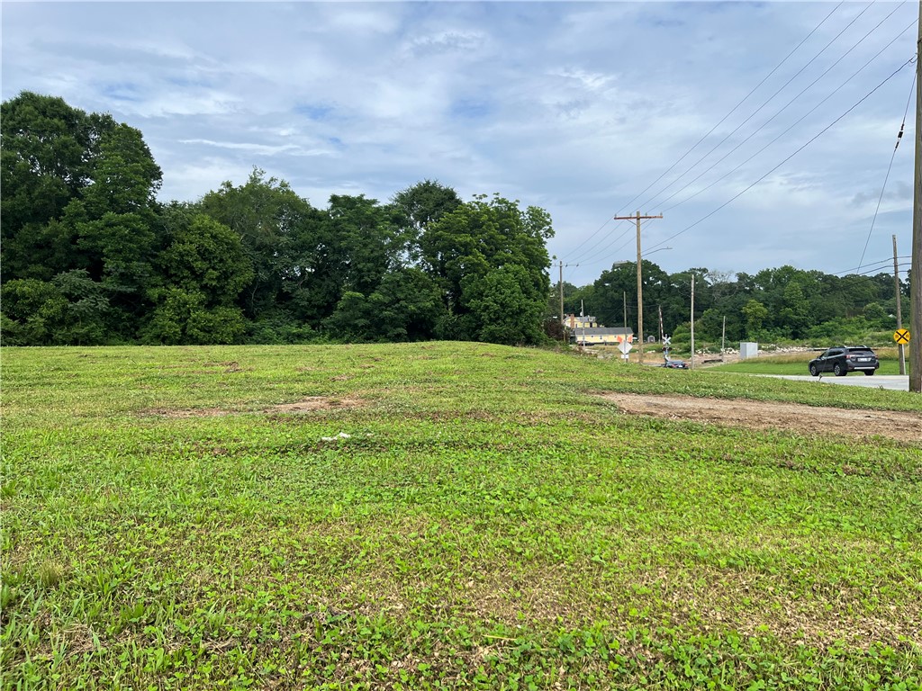 237 East Main Street Pendleton, SC 29670 - Photo 11 of 16 A spacious, verdant lot awaits your vision, bordered by mature trees and convenient road access.