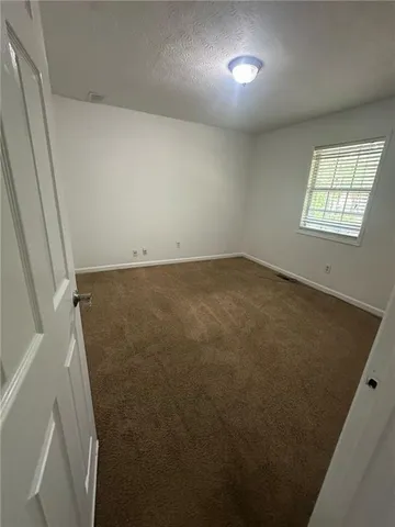 a bathroom with a sink a mirror and a bathtub