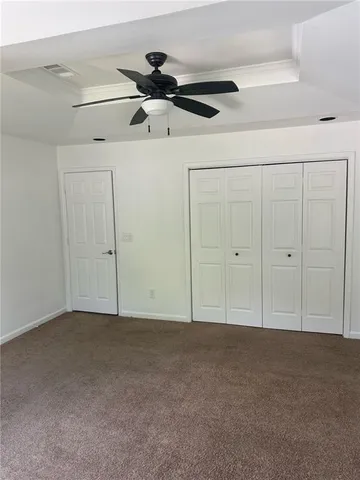 a kitchen with stainless steel appliances granite countertop a refrigerator a stove a sink and a granite counter tops