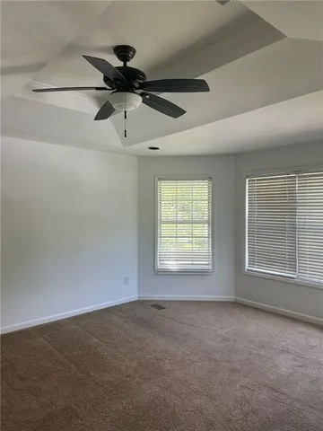 a stove top oven sitting inside of a kitchen
