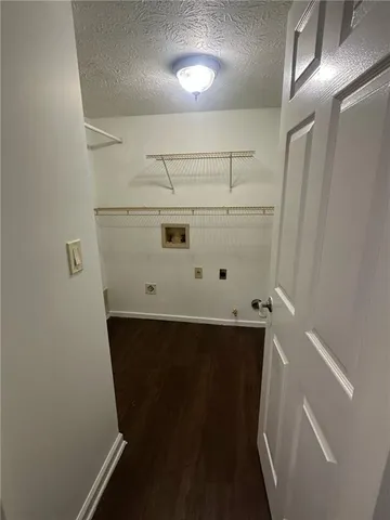 a view of wooden floor and staircase