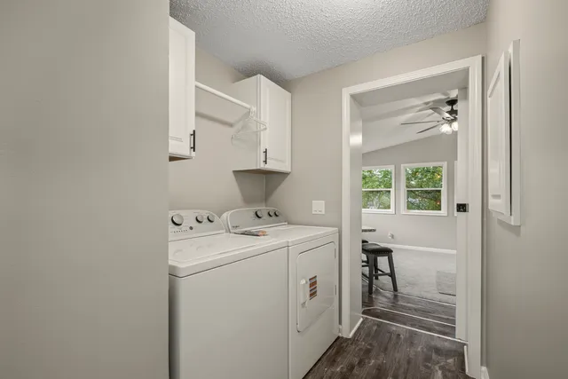 a utility room with dryer and washer