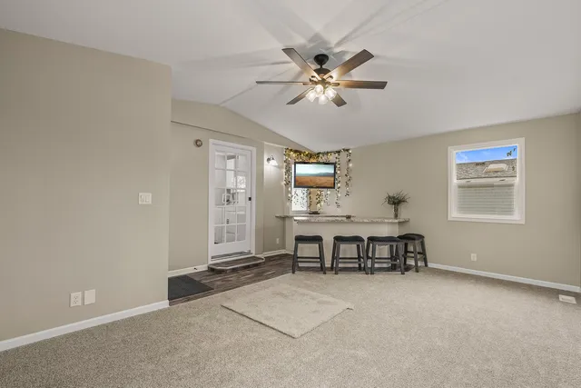 a view of a workspace with furniture