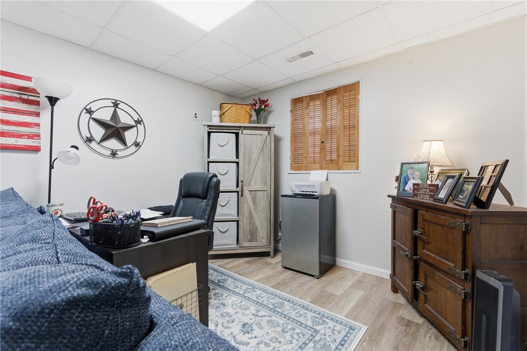 707 West Martindale Road Union, OH 45322 - Photo 20 of 28 This versatile room offers a comfortable and organized space for productivity or relaxation.