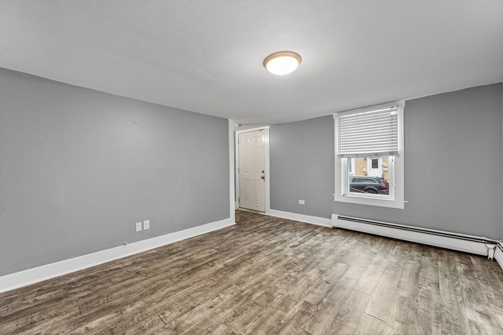 25 Durham Street Lawrence, MA 01843 - Photo 15 of 34 a view of room with window and ceiling fan