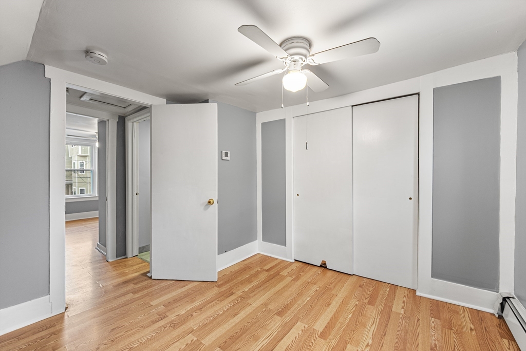 25 Durham Street Lawrence, MA 01843 - Photo 17 of 34 a view of an empty room with wooden floor