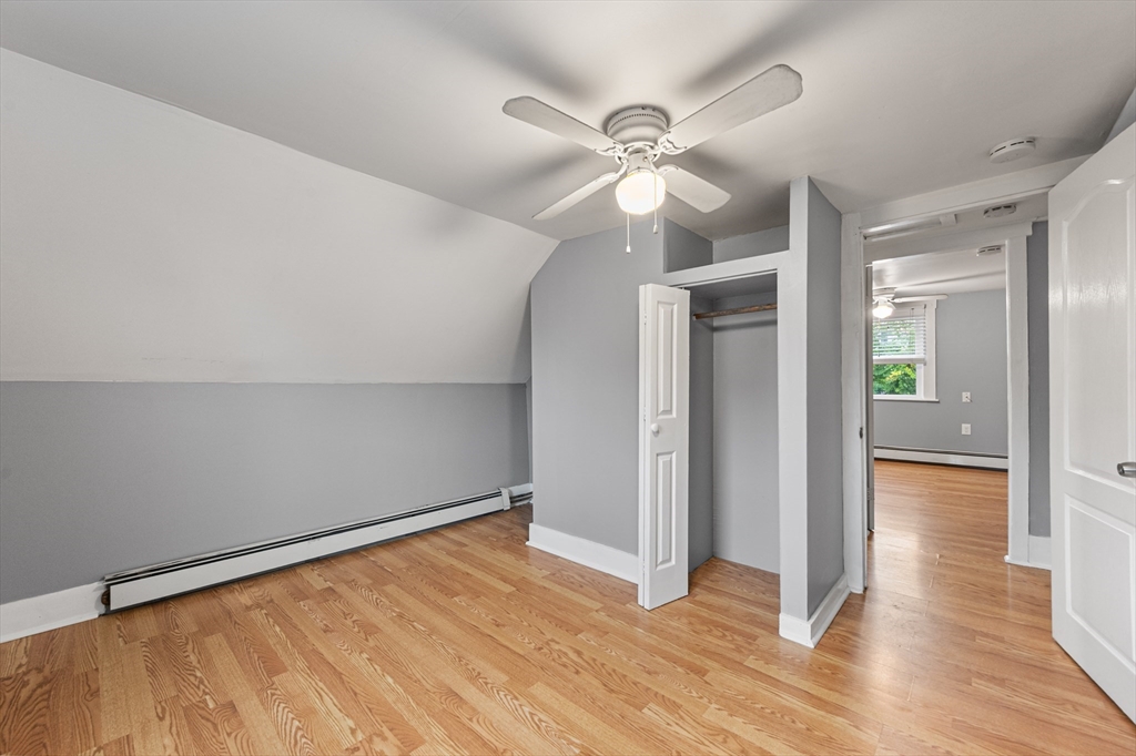 25 Durham Street Lawrence, MA 01843 - Photo 19 of 34 a view of empty room with wooden floor