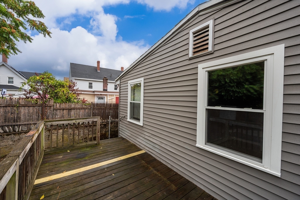 25 Durham Street Lawrence, MA 01843 - Photo 26 of 34 a view of a balcony with wooden floor