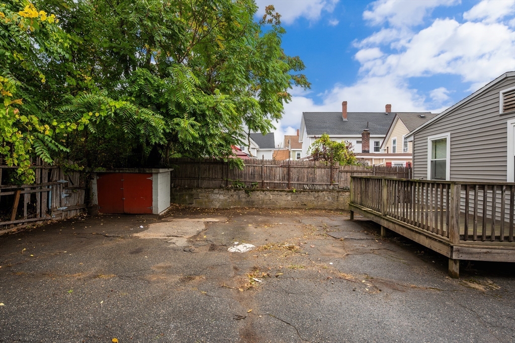 25 Durham Street Lawrence, MA 01843 - Photo 31 of 34 a view of a house with a yard