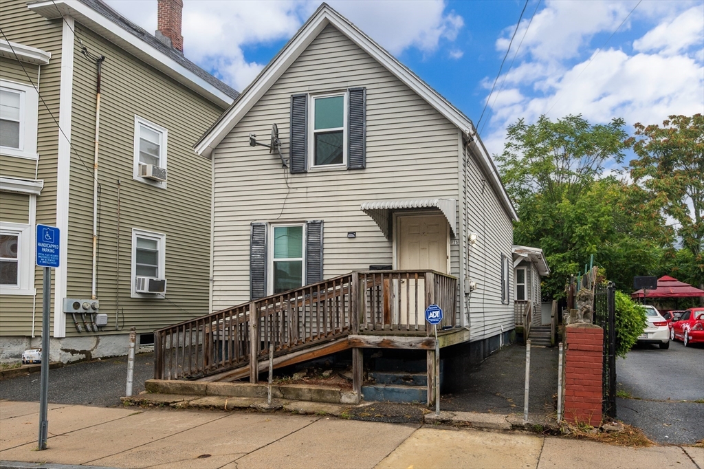 25 Durham Street Lawrence, MA 01843 - Photo 32 of 34 a view of a house with wooden fence
