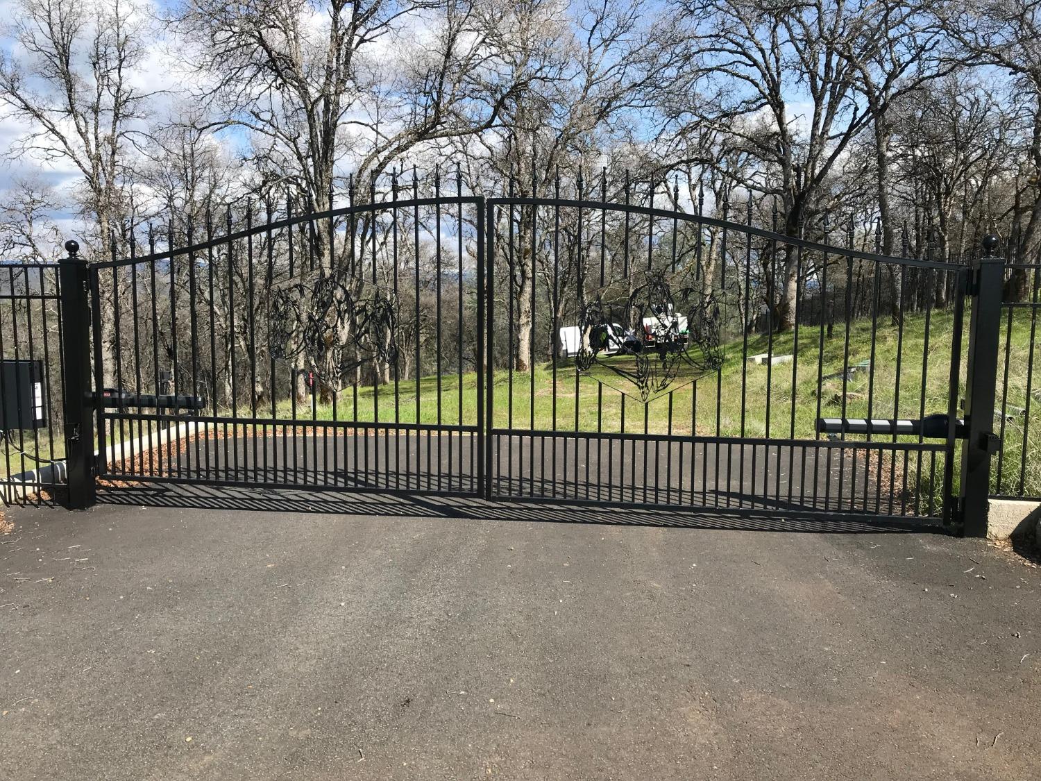 a view of a gate and fence