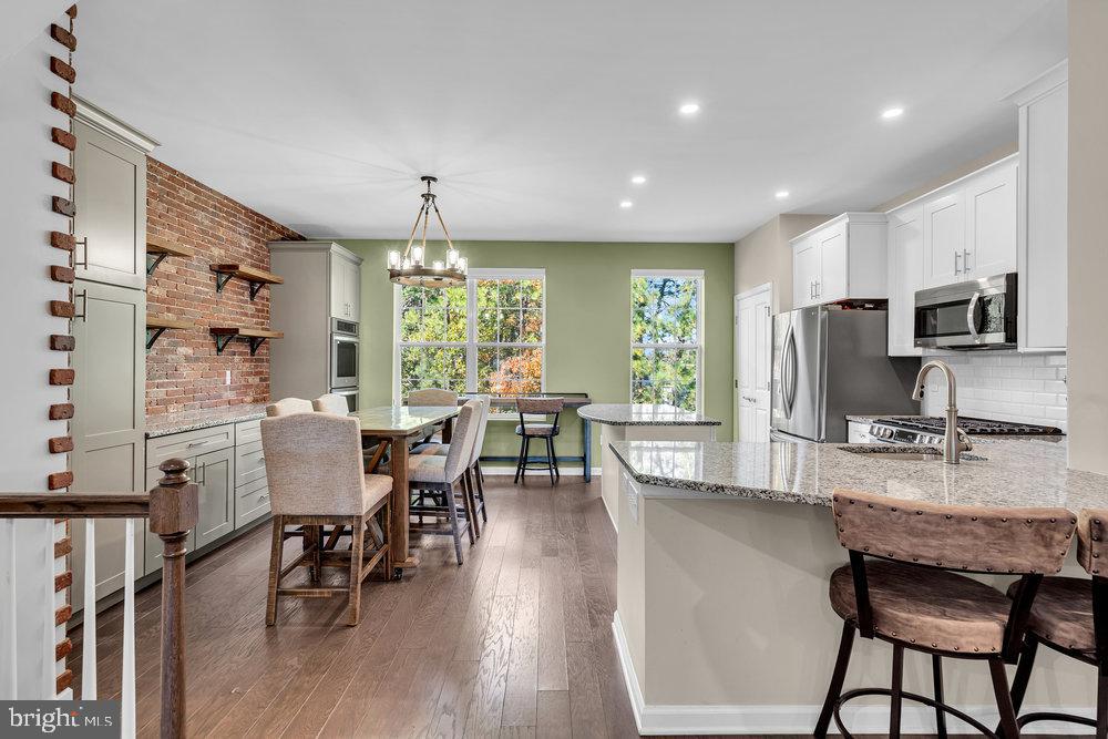 305 Spirit Way Brick, NJ 08723 - Photo 12 of 29 a dining room with furniture window wooden floor