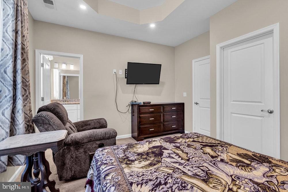 305 Spirit Way Brick, NJ 08723 - Photo 20 of 29 a bedroom with a bed and a television