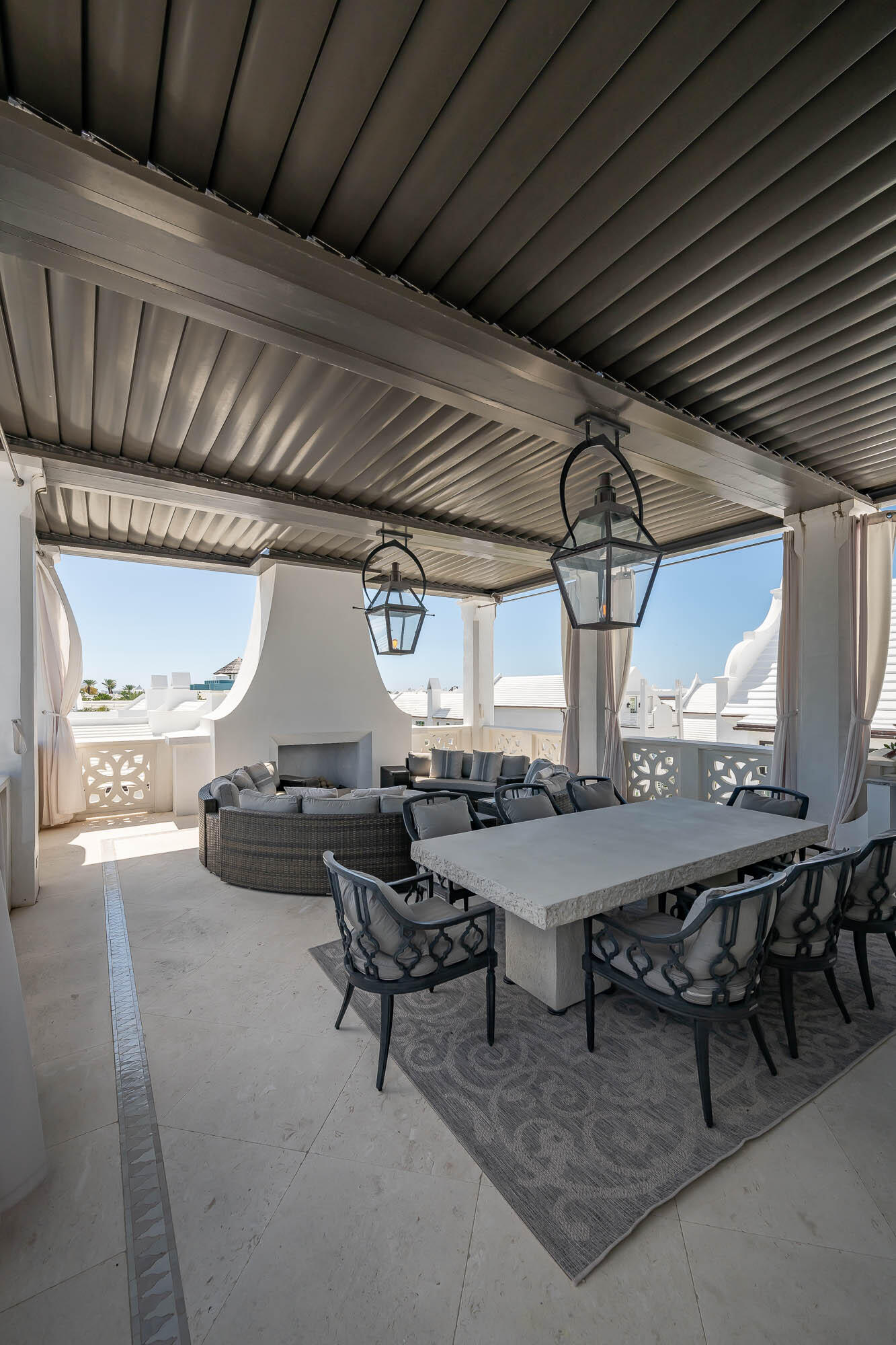 214 Charles Street Inlet Beach, FL 32461 - Photo 60 of 75 a outdoor space with lots of furniture and white walls