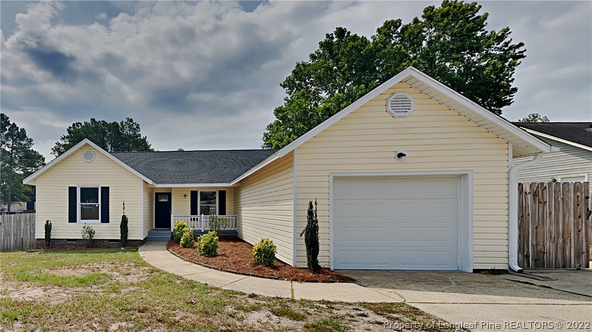 1153 Hoke Loop Road Fayetteville, NC 28314 - Photo 1 of 20 a view of a house with backyard