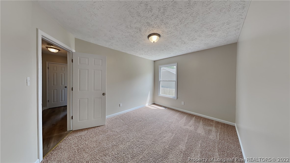 1153 Hoke Loop Road Fayetteville, NC 28314 - Photo 13 of 20 a view of empty room