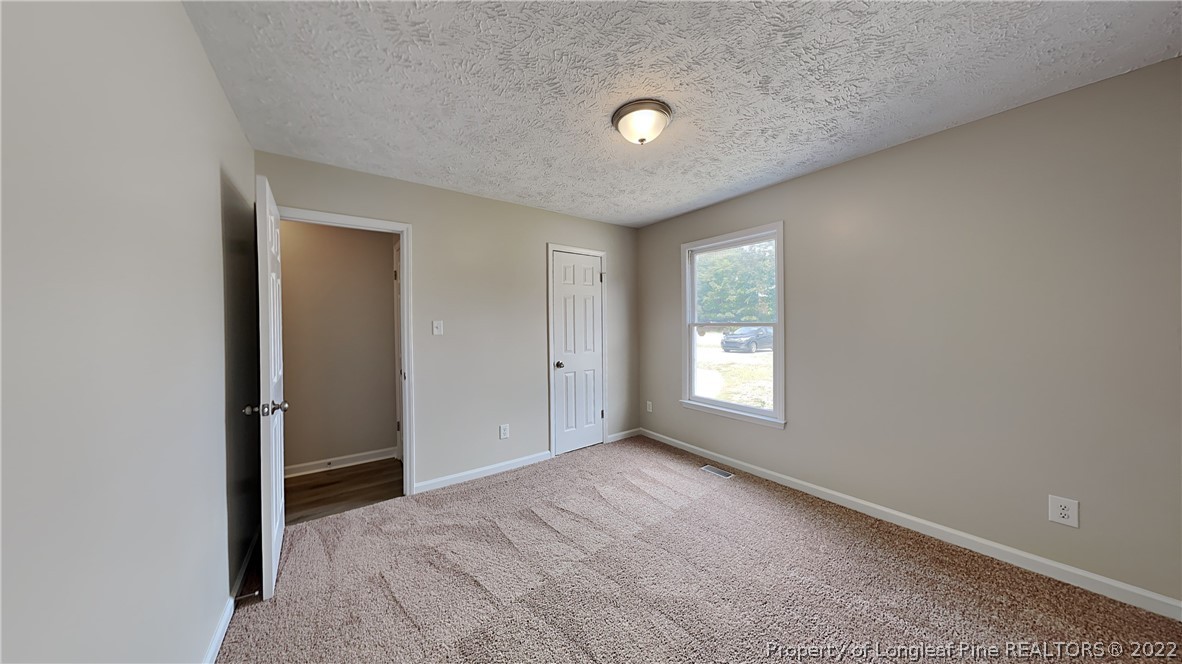 1153 Hoke Loop Road Fayetteville, NC 28314 - Photo 15 of 20 a view of empty room with window