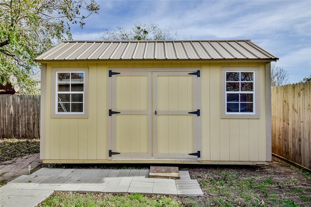 214 Gandy Street Lipan, TX 76462 - Photo 35 of 40 a front view of a house with a wooden fence