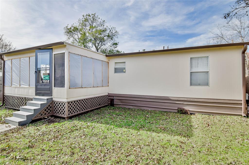 214 Gandy Street Lipan, TX 76462 - Photo 37 of 40 a front view of a house with a garden