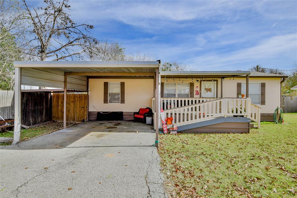 214 Gandy Street Lipan, TX 76462 - Photo 5 of 40 front view of a house with a yard