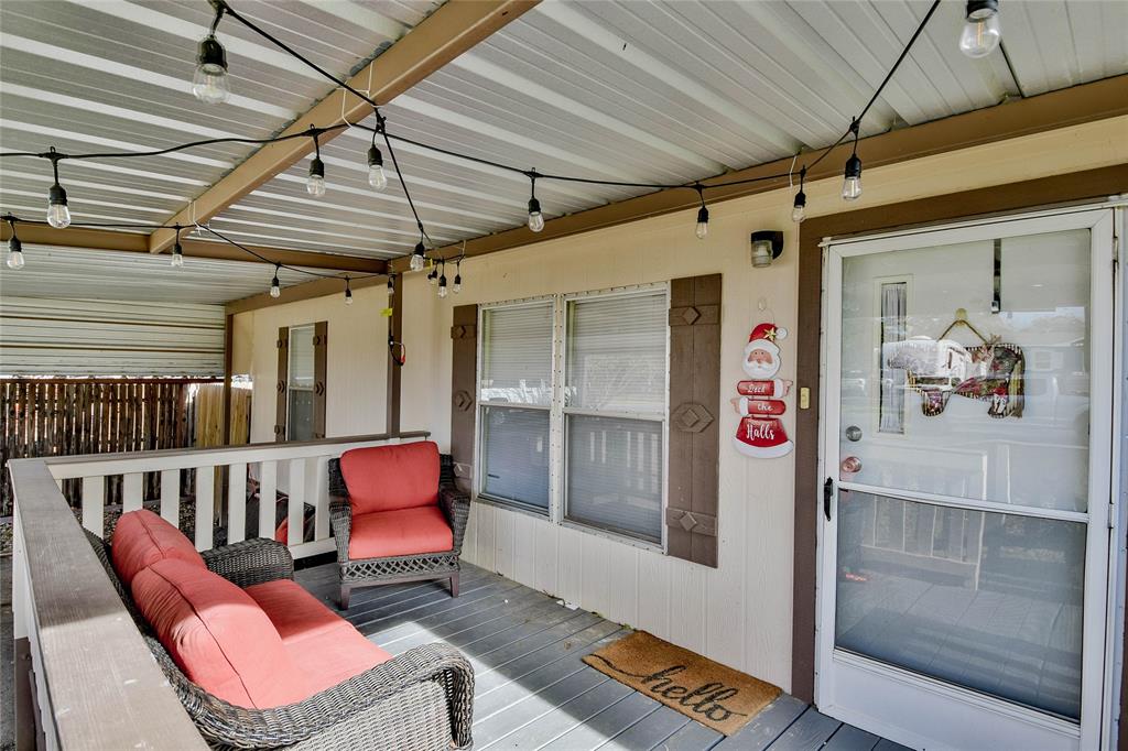 214 Gandy Street Lipan, TX 76462 - Photo 6 of 40 a outdoor living space with furniture and a couch