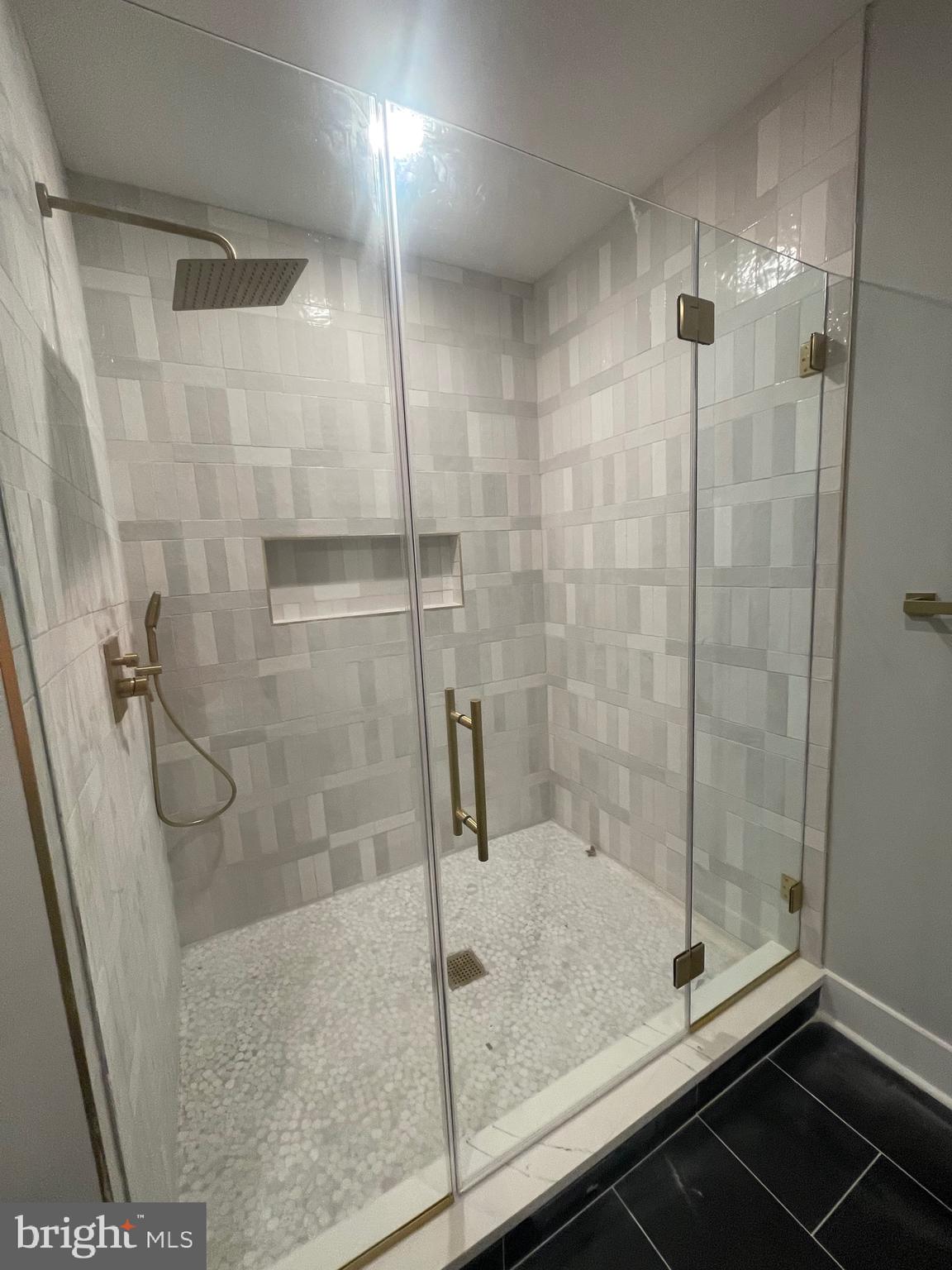 7521 Ridge Avenue Philadelphia, PA 19128 - Photo 11 of 13 a bathroom with a shower