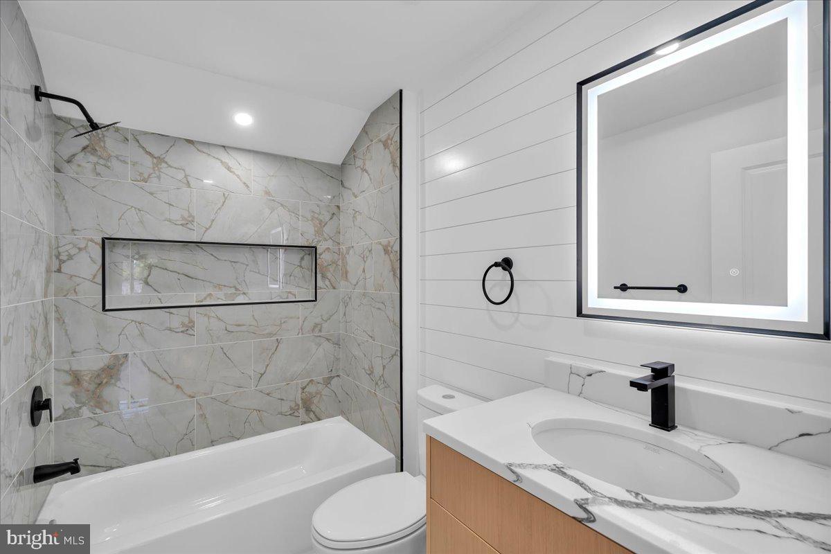 2504 Church Road Cinnaminson, NJ 08077 - Photo 38 of 79 a bathroom with a granite countertop sink mirror toilet and bathtub