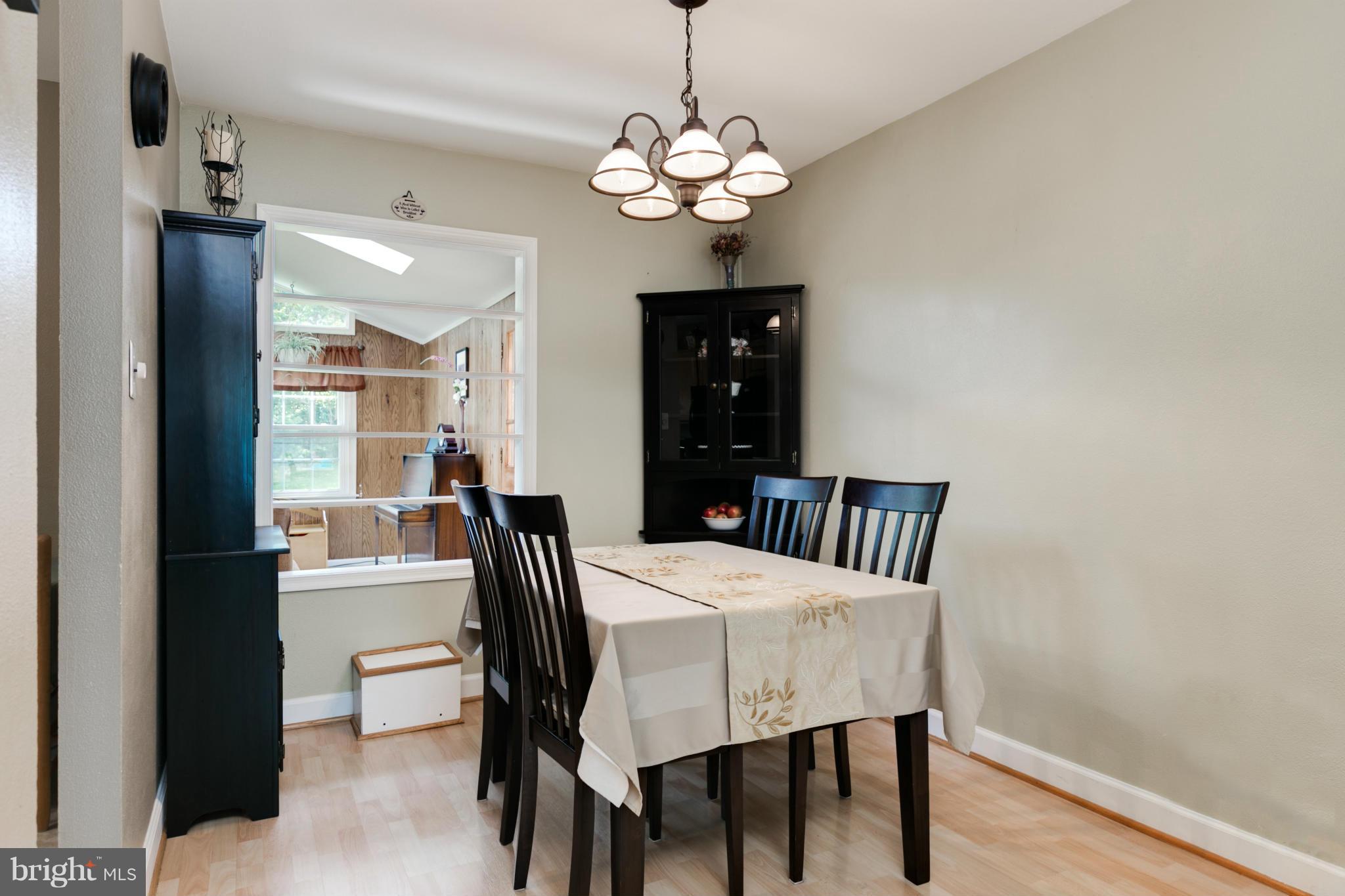 802 West Poplar Road Sterling, VA 20164 - Photo 7 of 29 open to the living room and family room pass thru