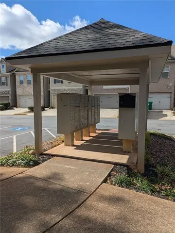 a view of a house with a door and a wooden floor