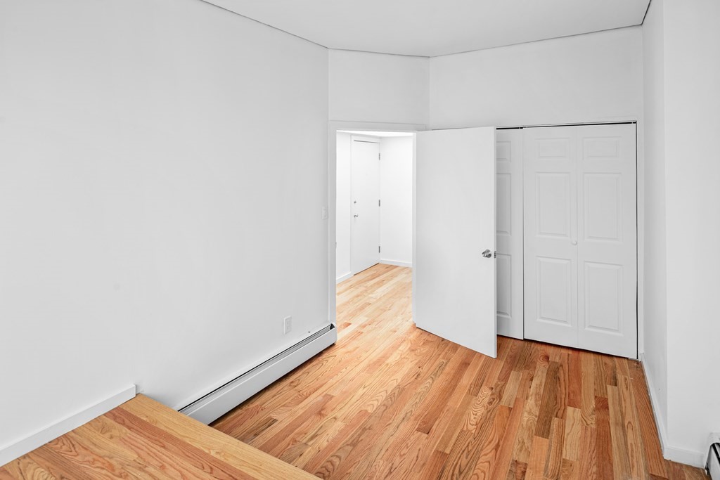 15 Fayette Street, Unit 7 Boston, MA 02116 - Photo 11 of 16 a view of a room with wooden floor
