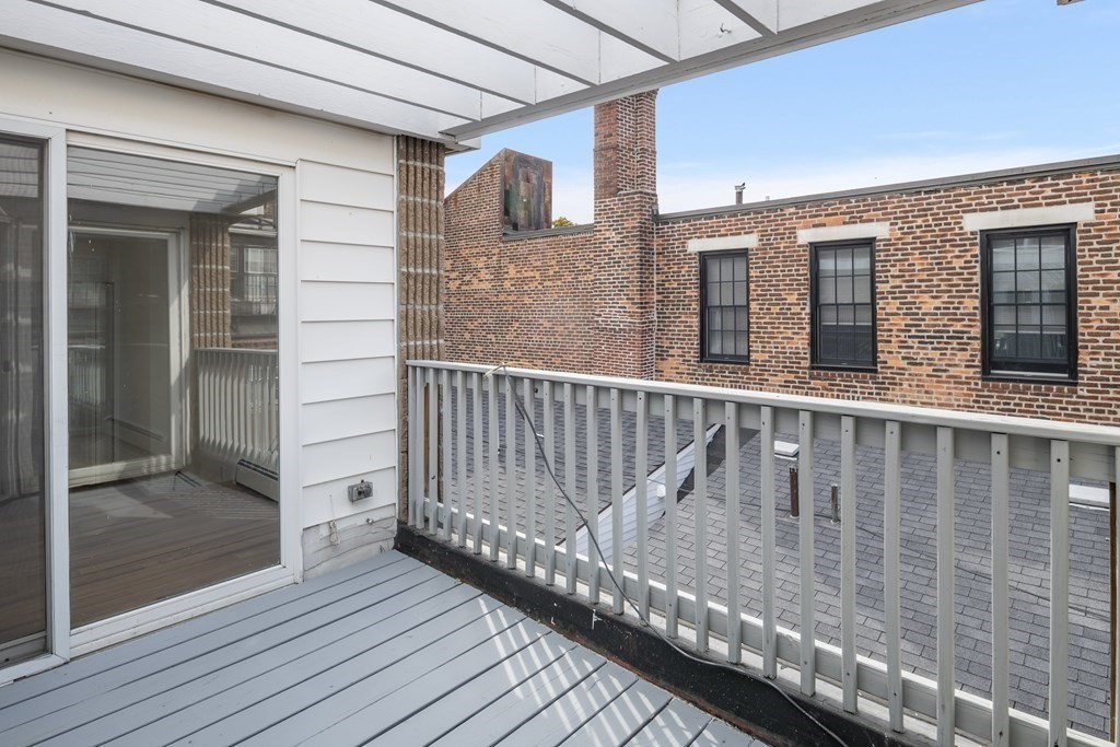 15 Fayette Street, Unit 7 Boston, MA 02116 - Photo 14 of 16 a view of wooden balcony