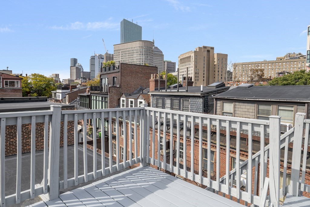 15 Fayette Street, Unit 7 Boston, MA 02116 - Photo 15 of 16 a view of a large building with a city view