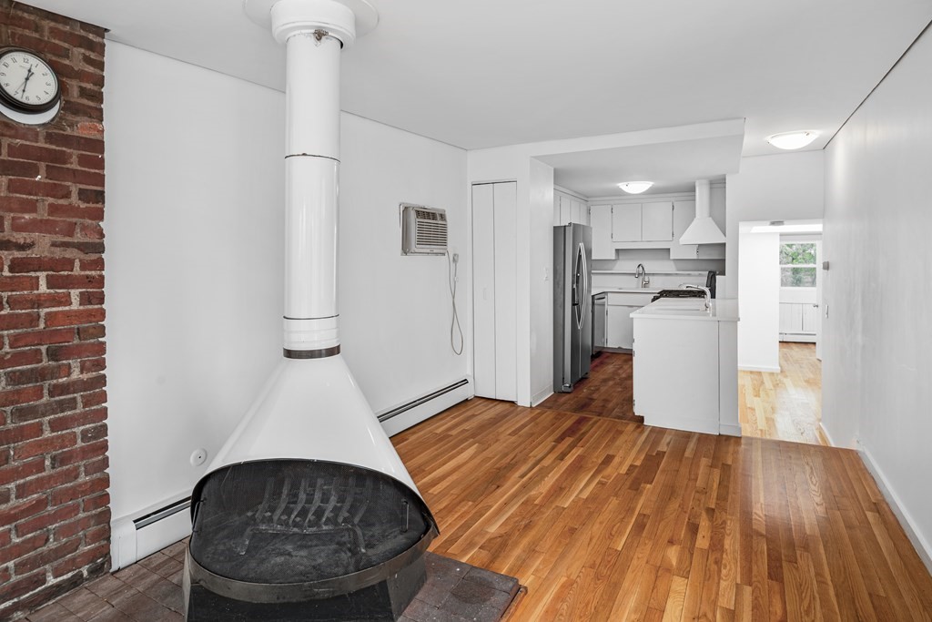 15 Fayette Street, Unit 7 Boston, MA 02116 - Photo 4 of 16 a view of kitchen with refrigerator and cabinets