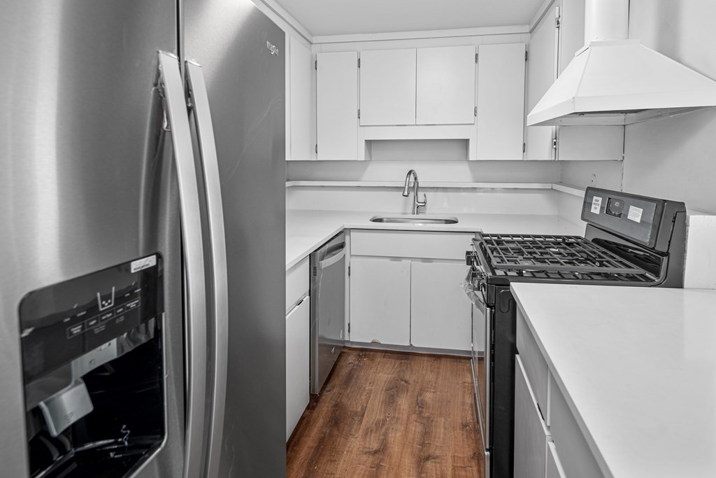 15 Fayette Street, Unit 7 Boston, MA 02116 - Photo 6 of 16 a kitchen with a sink stove and refrigerator