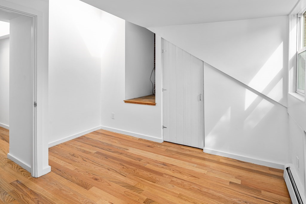 15 Fayette Street, Unit 7 Boston, MA 02116 - Photo 9 of 16 a view of a room with wooden floor