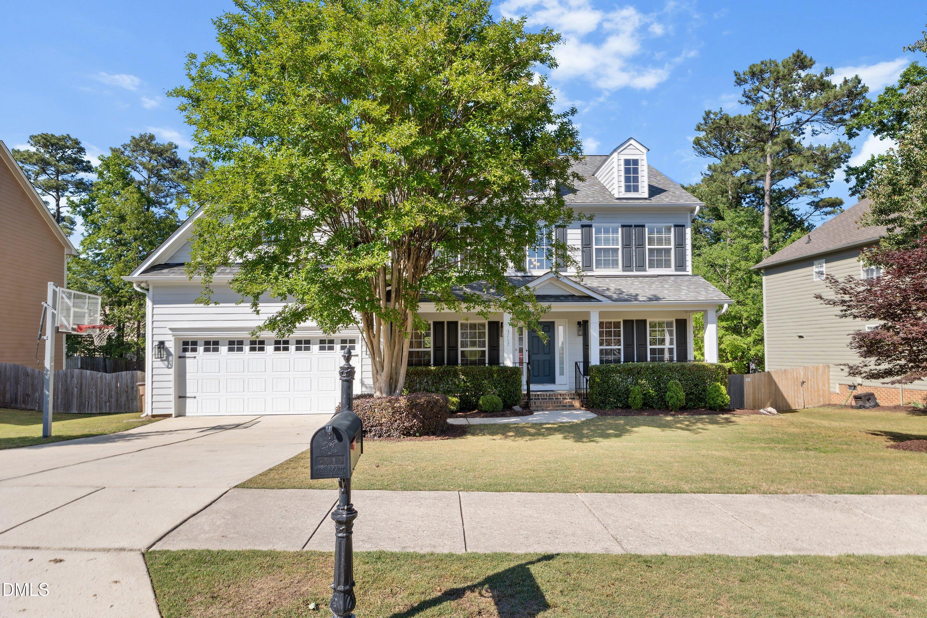 3717 Windmeade Road Wake Forest, NC 27587 - Photo 1 of 51 a front view of a house with a yard