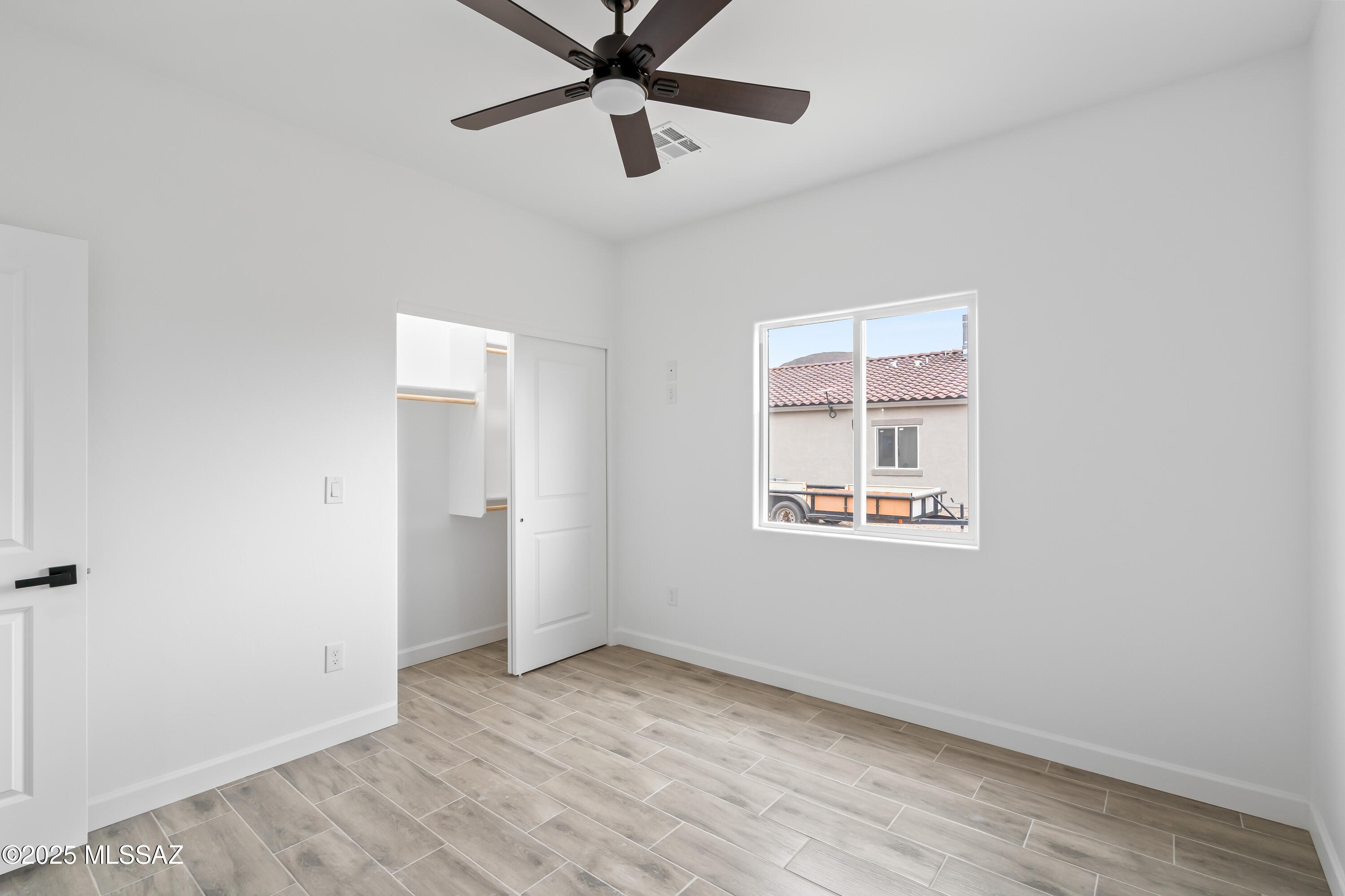 1917 Circulo Mexicali Rio Rico, AZ 85648 - Photo 12 of 28 a view of an empty room with a window