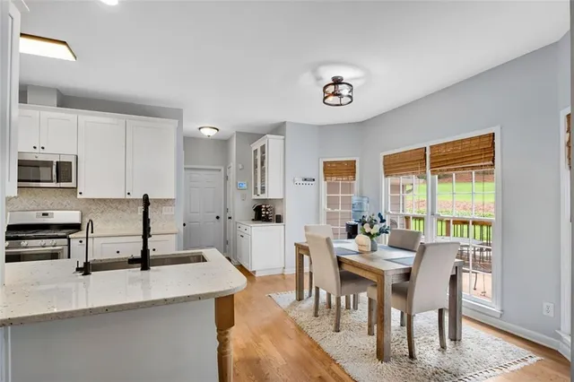 a view of a dining room with furniture