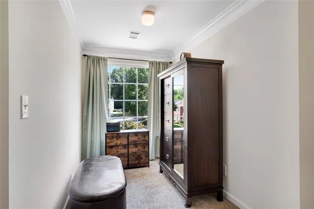 a bathroom with a granite countertop sink a large mirror and a bathtub