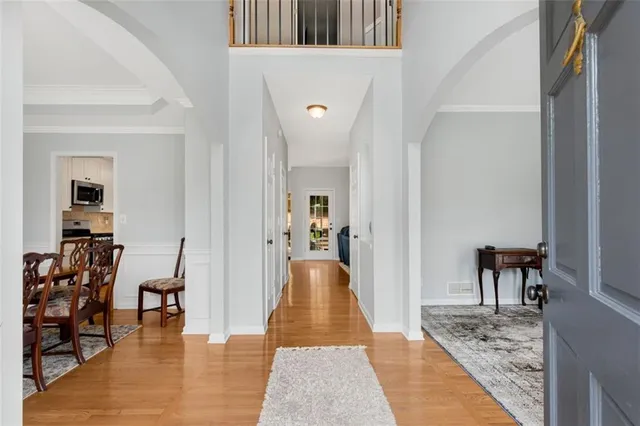 a view of a livingroom with furniture and front door