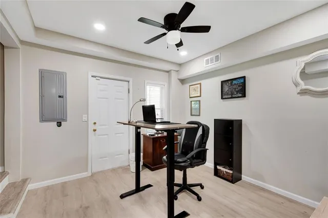 a view of a backyard with large trees