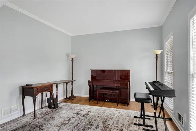 a view of a workspace with furniture