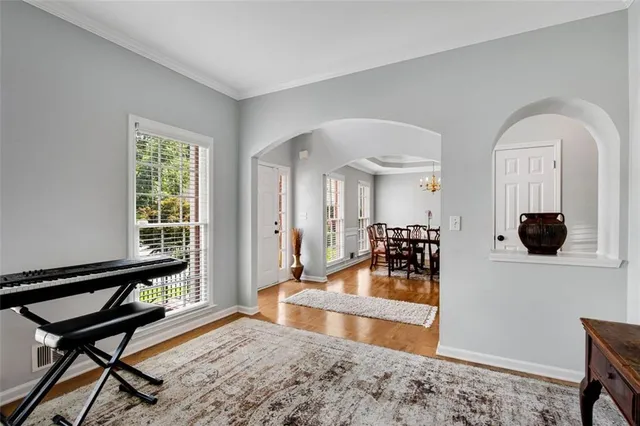 a living room with furniture and a window