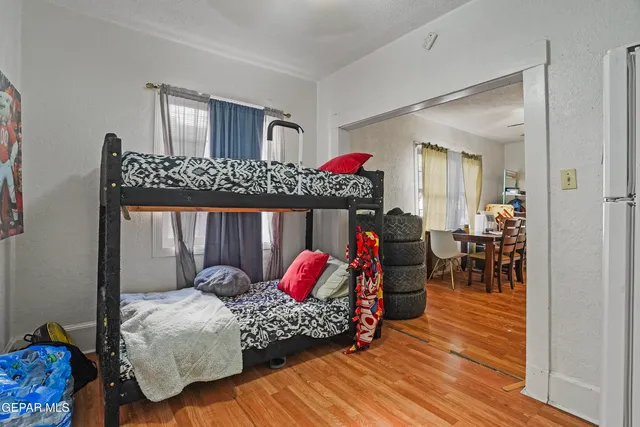 a bedroom with furniture and a bed